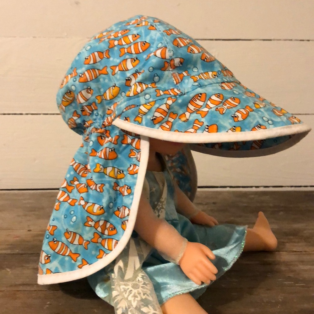 Blue baby hat with clown fish